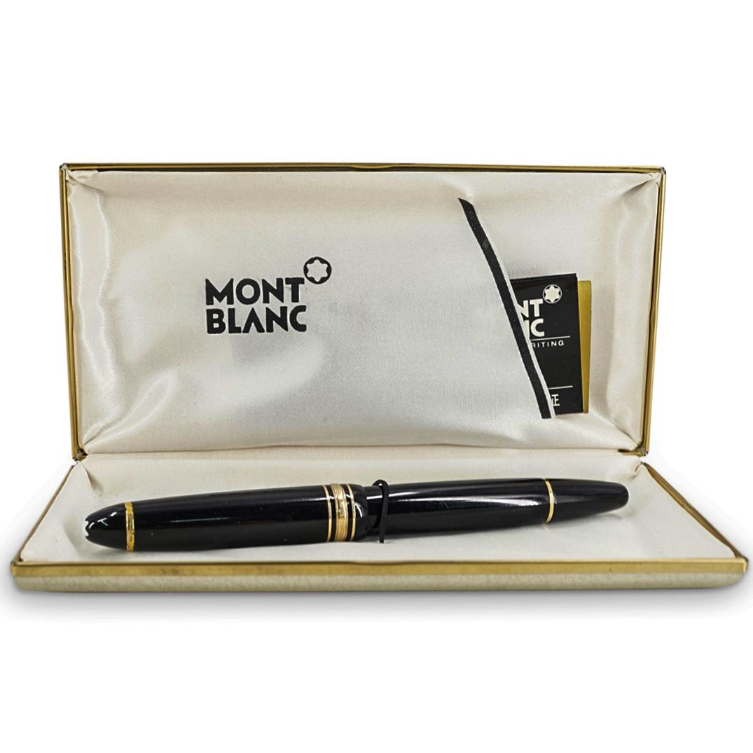 Montblanc Black Meisterstuck 18K Le Grand Fountain Ink Pen: DESCRIPTION: A MontBlanc Black Meisterstuck fountain ink pen with characteristic gold trim and 18K gold nib. Engraved "MontBlanc Meisterstuck". The Meisterstuck LeGrand in black resin with gold-coated