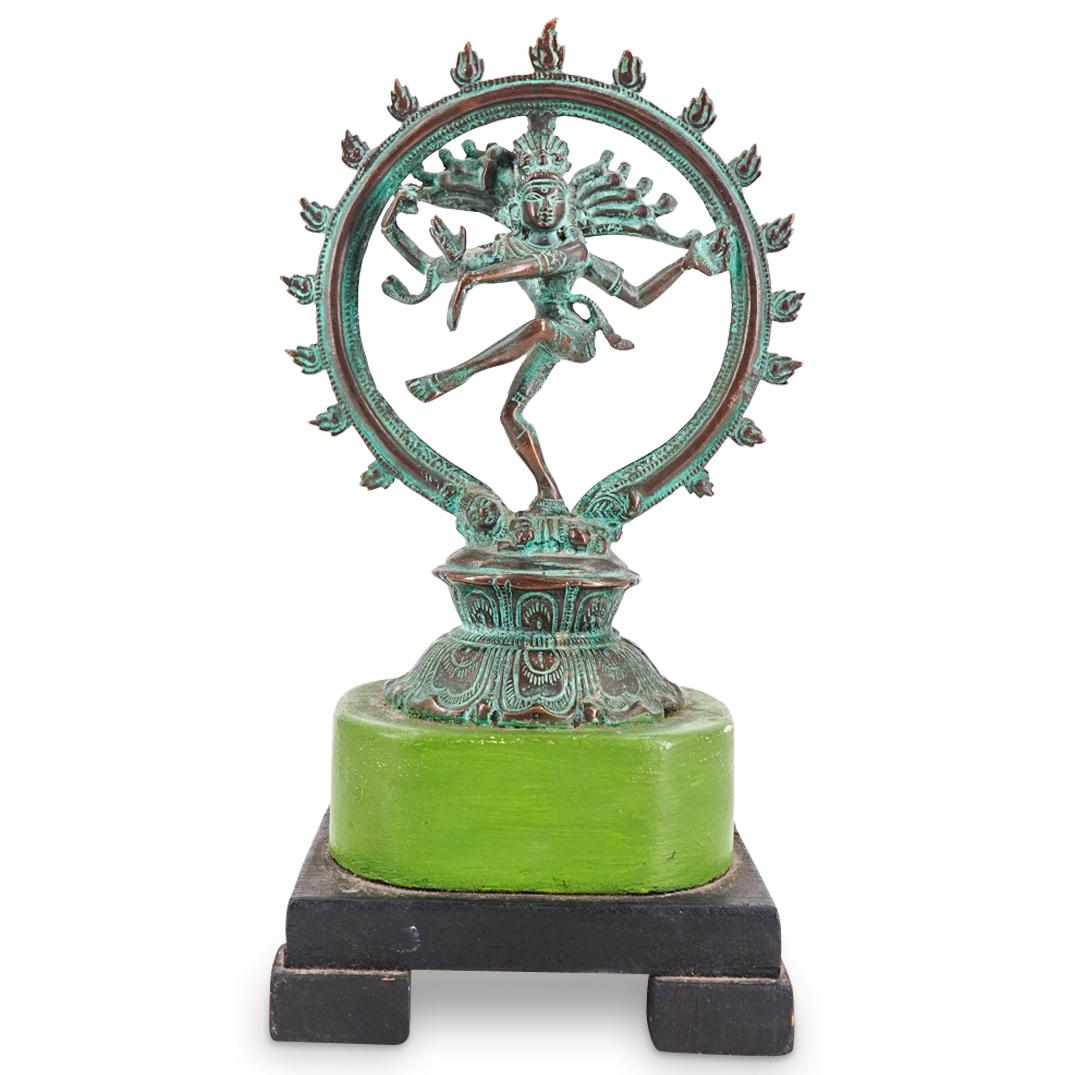 Antique Indian Metal Nataraja Hindu Sculpture: DESCRIPTION: Antique Indian patinated metal hindu sculpture depicting nataraja atop a double lotus throne. Mounted atop a green and black lacquered wood base with four feet. CIRCA: Early to Mid 20th C