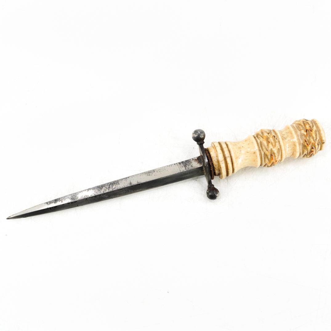 Attr. Antique English Navy Officers Dirk: DESCRIPTION: Attributed Antique English Navy Officers dirk knife comprising of a thin double edged tapering blade, spherical ends at the hilt, a baluster carved bone handle with two bands of cord desi