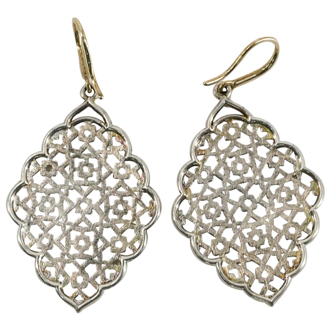 Paloma Picasso for Tiffany & Co Sterling Earrings: DESCRIPTION: Paloma Picasso for Tiffany & Co Sterling silver earrings from the Marrakesh Collection comprising of open work Moroccan geometric inspired designs at the pendants, completed with vermeil 