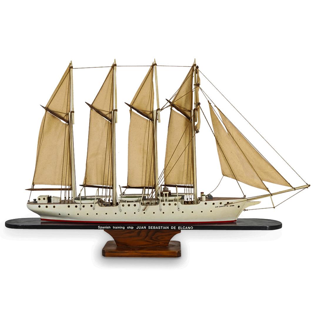 Scale Model Of Spanish Training Ship Juan Sebastian De Elcano: DESCRIPTION: Scale wooden model of the Spanish training ship Juan Sebastian de Elcano featuring fabric sails and rigging and mounted on a wooden base marked on the side with ship's name and nature. CI