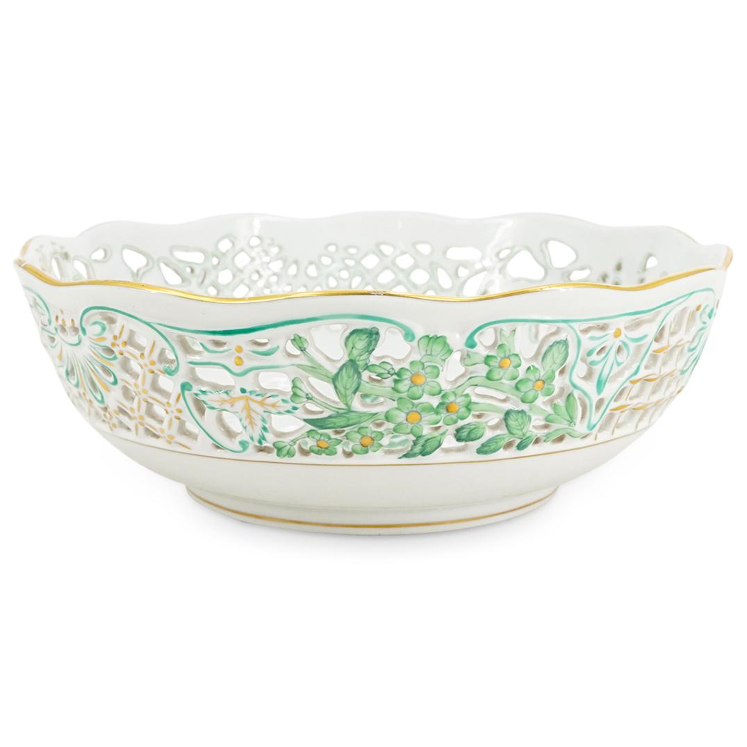 Herend Porcelain "Chinese Bouquet-Green" Circular Open Weave Bowl: DESCRIPTION: Herend porcelain circular open weave bowl in the green hued "Chinese Bouquet" (AV) pattern on glazed white porcelain. Depicts green floral motifs. Finished with gilded accents. Style:#743