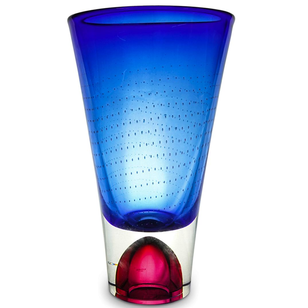 Goran Warff Kosta Boda Art Glass Vase: DESCRIPTION: A 1980s signed Kosta Boda art glass vase by designer Goran Warff designed with sommerso technique with cobalt blue and magenta color with clear glass exterior. Further embellished with co