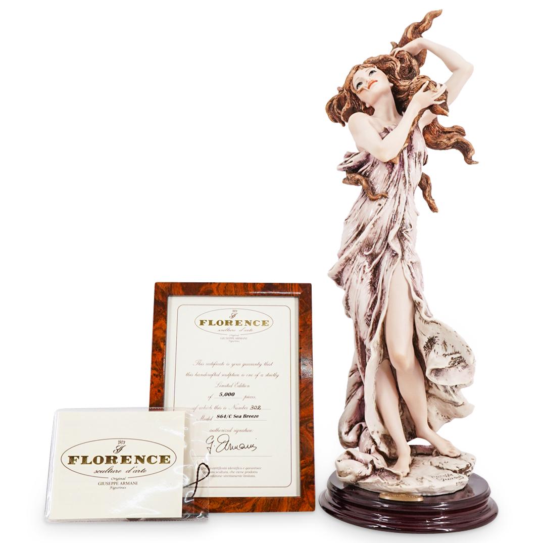 Limited Edition G. Armani "Sea Breeze" Capodimonte Porcelain Figurine: DESCRIPTION: A limited Edition Giuseppe Armani Capodimonte porcelain figurine. Model "Sea Breeze". With wooden base. Marked with the Capodimonte and Giuseppe Armani signature hallmarks. Marked "Limite