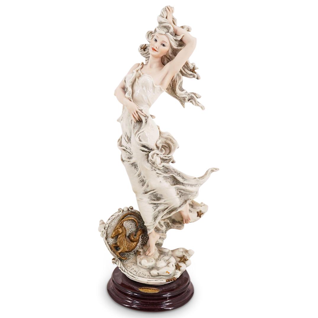 G. Armani "Capricorn" Capodimonte Porcelain Figurine: DESCRIPTION: A Giuseppe Armani Capodimonte porcelain figurine. Model "Capricorn". With wooden base. Marked with the Capodimonte and Giuseppe Armani signature hallmarks. SERIAL #:875F MAKER: Capodimont