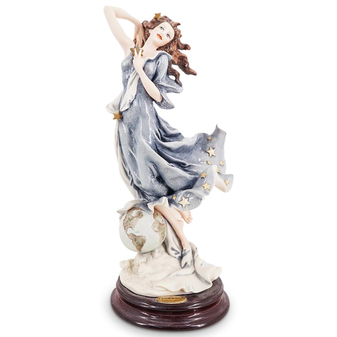 Limited Edition G. Armani "Celeste" Capodimonte Porcelain Figurine: DESCRIPTION: A limited edition Giuseppe Armani Capodimonte porcelain figurine. Model "Celeste" 2000 Figurine of the Year. With wooden base. Marked with the Capodimonte, Florence, and Giuseppe Armani s