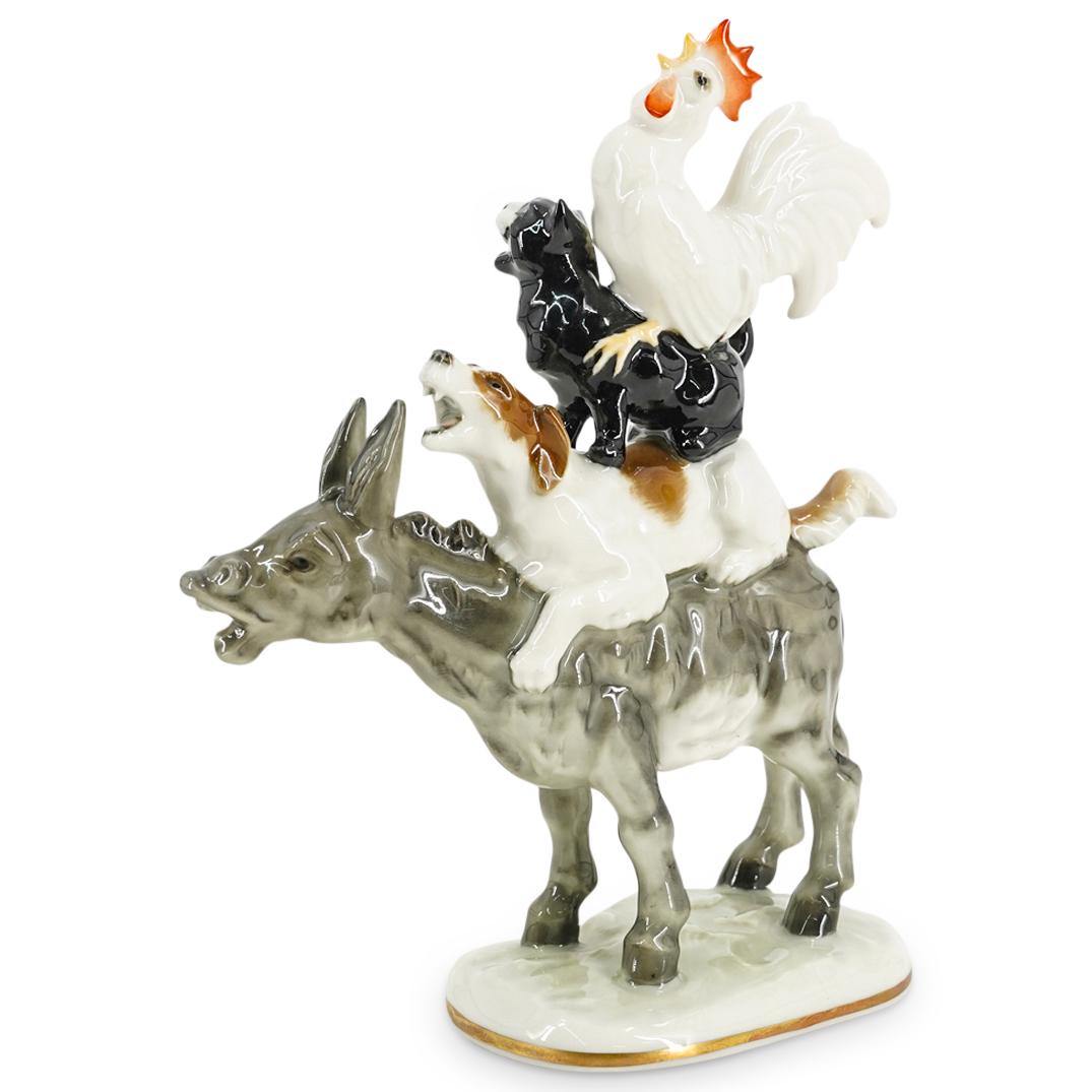 Lorenz Hutschenreuther Porcelain "Bremen Town of Musicians" Figurine: DESCRIPTION: A German Lorenz Hutschenreuther Kunstabteilung "Bremen Town of Musicians" porcelain figurine depicting a rooster, a cat, and a dog, atop a donkey. Based on the Brothers Grimm's The "Town 