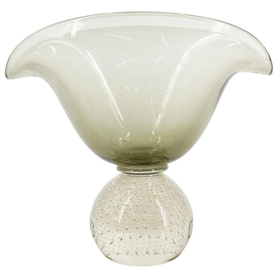 Italian Mid Century Murano Bullicante Art Glass Vase: DESCRIPTION: Italian Mid Century Murano bullicante art glass vase in smoke grey hues designed with an organic oval shape with folded rim, and atop a spherical art glass support base, with Bullicante c