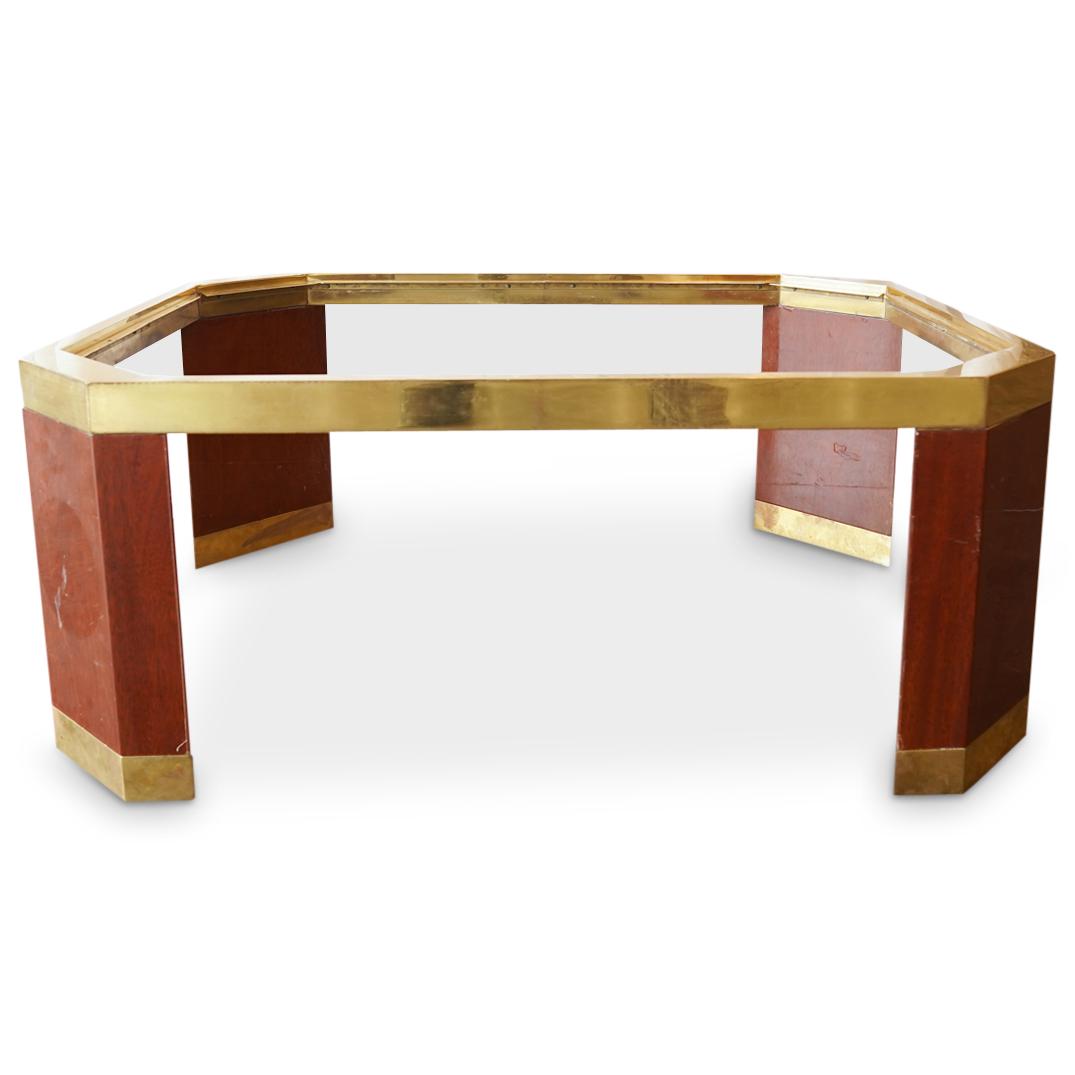 Ron Seff Brass Cocktail Table: DESCRIPTION: Ron Seff Mid Century Modern glass, brass, and wood, cocktail table. CIRCA: 1980s ORIGIN: USA DIMENSIONS: H: 17.12" x W: 32" x L: 42" Have a similar item to sell? Reach Out: https://www.ak