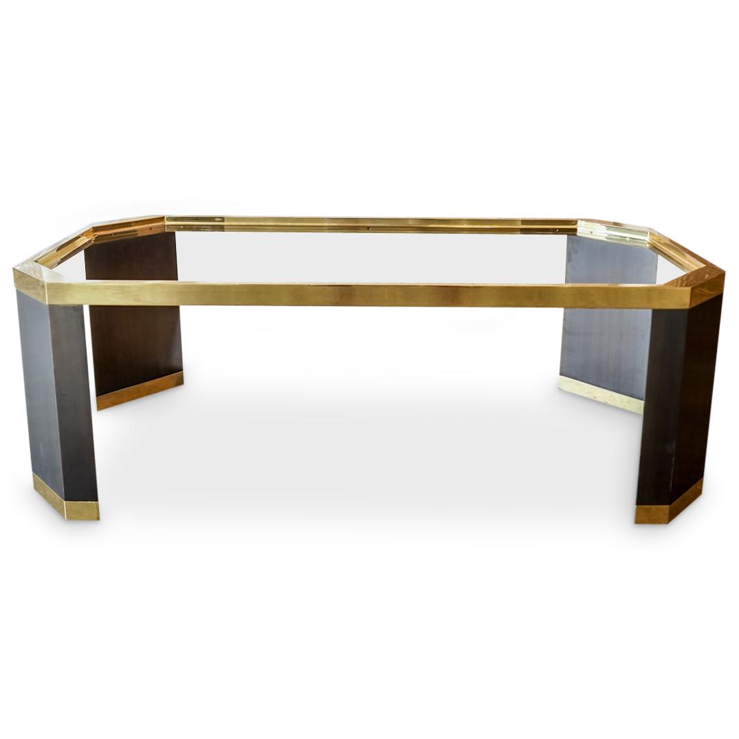 Ron Seff Brass Cocktail Table: DESCRIPTION: Ron Seff Mid Century Modern glass, brass, and dark wood, cocktail table. CIRCA: 1980s ORIGIN: USA DIMENSIONS: H: 17.25" x W: 23.5" x L: 49.5" Have a similar item to sell? Reach Out: https