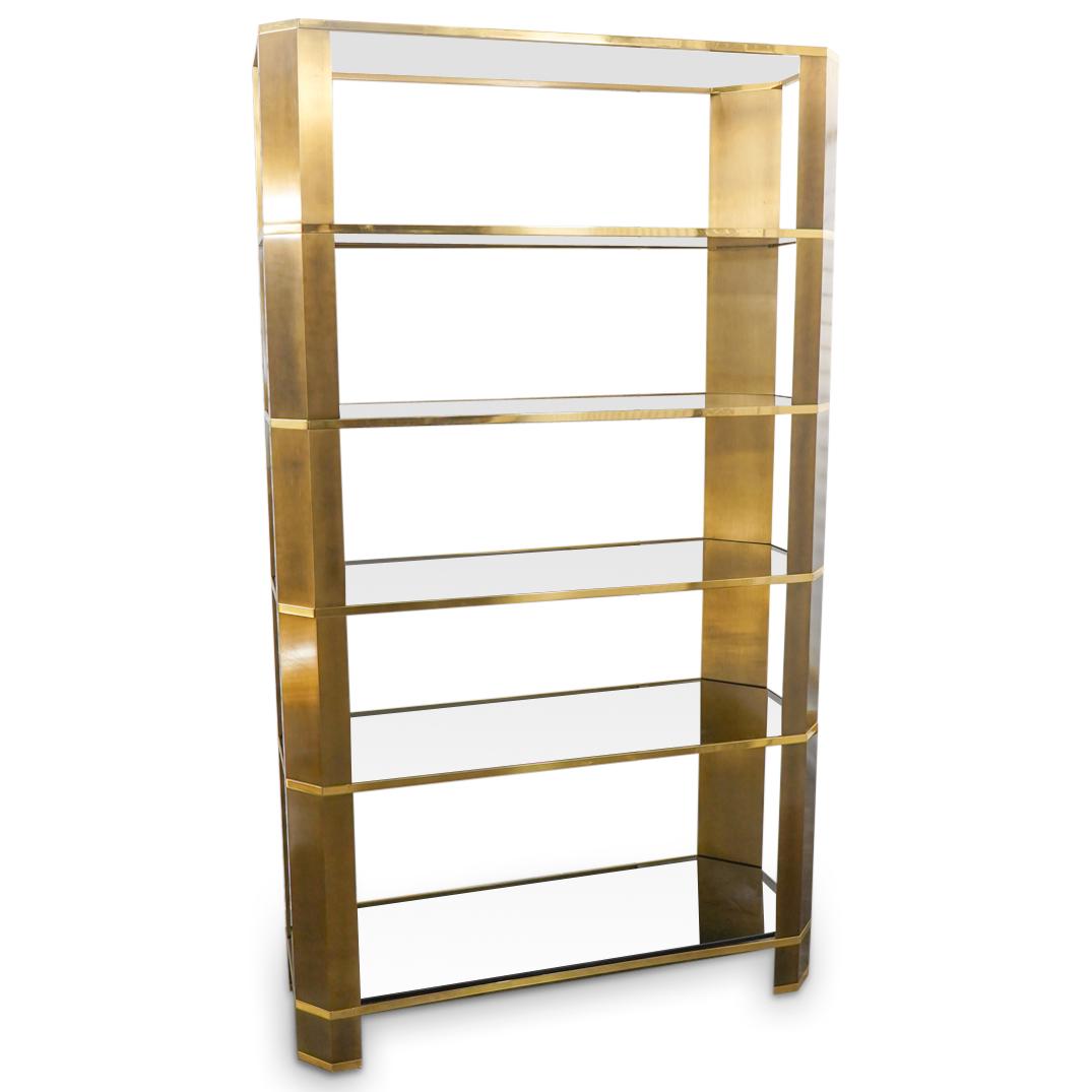 Ron Seff Brass Tiered Display Shelf: DESCRIPTION: Ron Seff Mid Century Modern brass tiered display shelf. CIRCA: 1980s ORIGIN: USA DIMENSIONS: H: 83.5" x W: 18.12" x L: 48.25" Have a similar item to sell? Reach Out: https://www.akibagall
