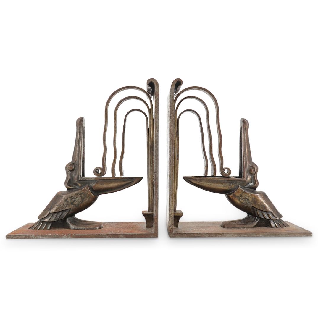 Possibly Edgar Brandt Pelican Bookends: DESCRIPTION: Possibly Edgar Brandt Art Deco pelican bookends composed of iron. CIRCA: Early 20th Century ORIGIN: France DIMENSIONS: H: 6.75" x L: 6.25" x W: 3" Have a similar item to sell? Contact: In