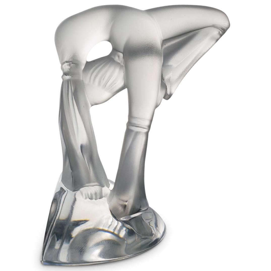 Lalique Crystal "Acrobat" Figurine: DESCRIPTION: A Lalique crystal "Acrobat" figurine, in clear frosted crystal depicting a gymnastic figure with a contortionist pose with leg down. Model number: 1194000. Embossed "Lalique / France". In