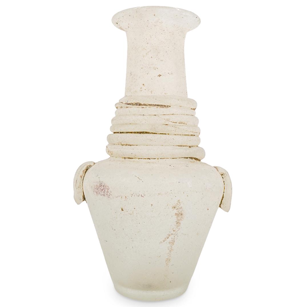 Murano Glass "A Scavo'' White Glass Vase: DESCRIPTION: Murano glass "A Scavo'' art glass vase by Seguso Vetri d'Arte, in white color with characteristic antique style Etruscan style. CIRCA: 20th Century ORIGIN: Italy DIMENSIONS: H: 15 1/4" W: