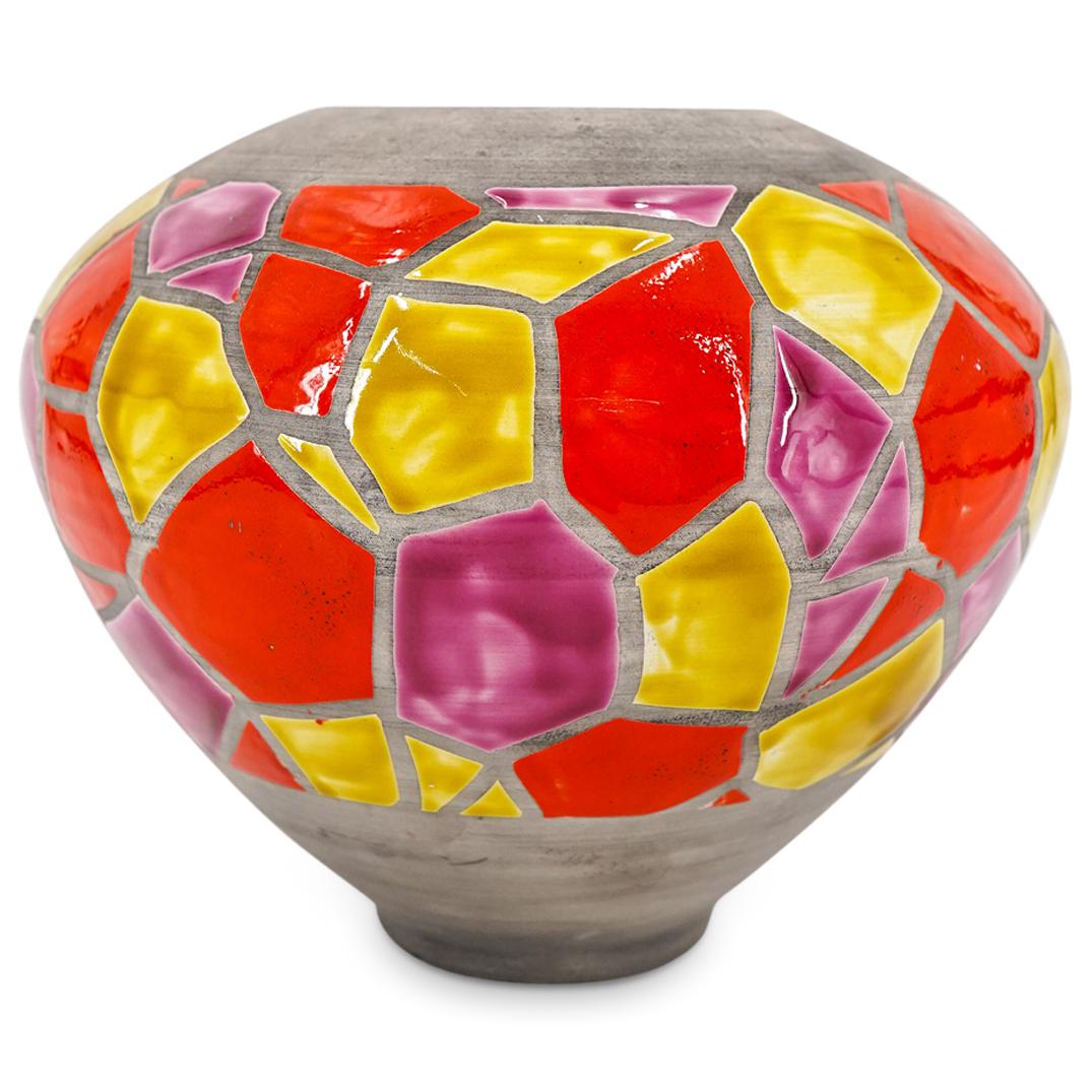 Italian Bitossi Art Pottery Bowl: DESCRIPTION: An Italian Bitossi art pottery bowl with a decoration of enamel glossy red, yellow and magenta irregular blocks on a background of raw dark grey clay with a glossy yellow interior. Unders