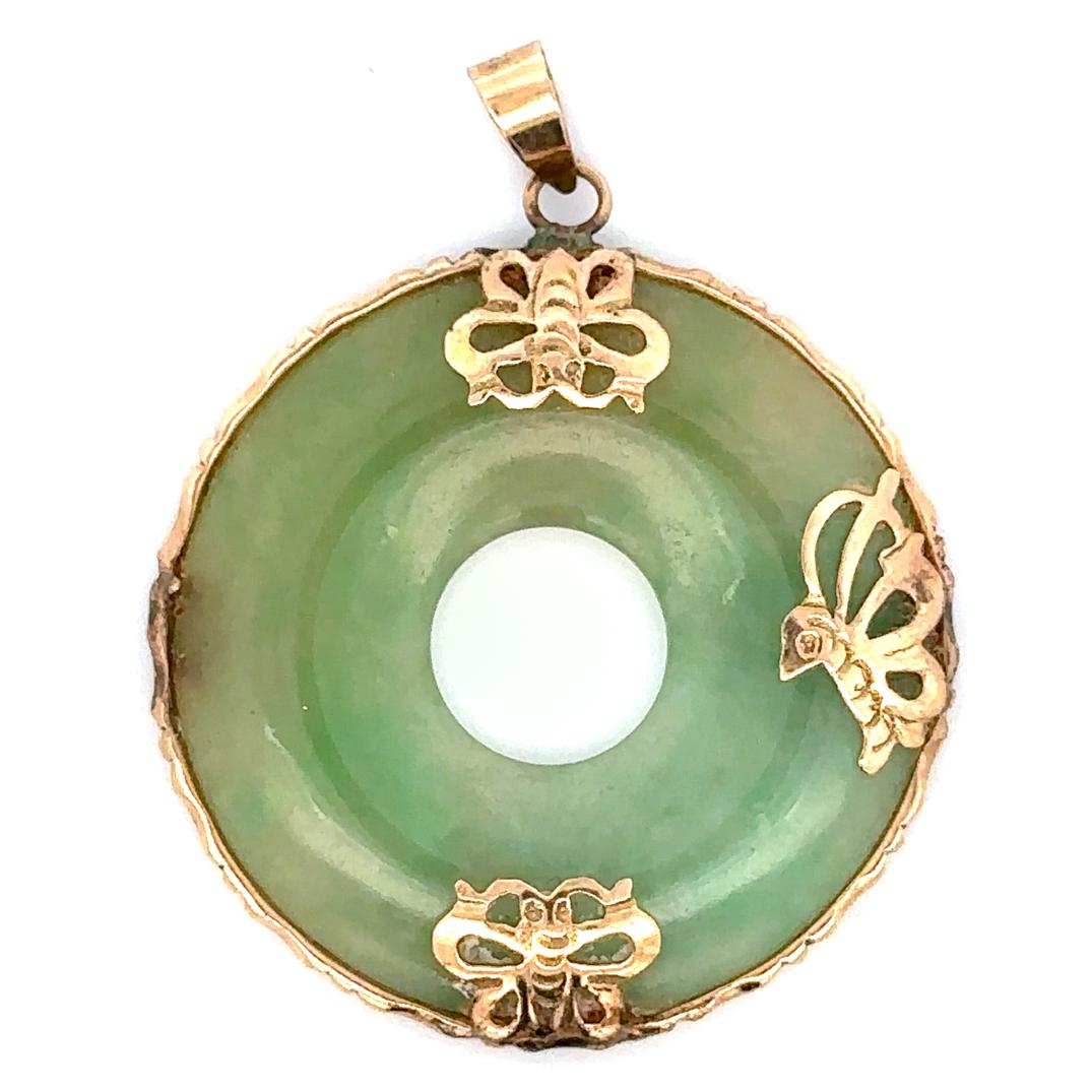 Chinese Jadeite 14K Gold Disc Pendant: DESCRIPTION: A vintage Chinese jadeite disc in a 14 karat yellow gold setting pendant. The setting features 3 insects around the disc (one missing). Marked 14k on the clasp. Total weight 5.1 grams / 3