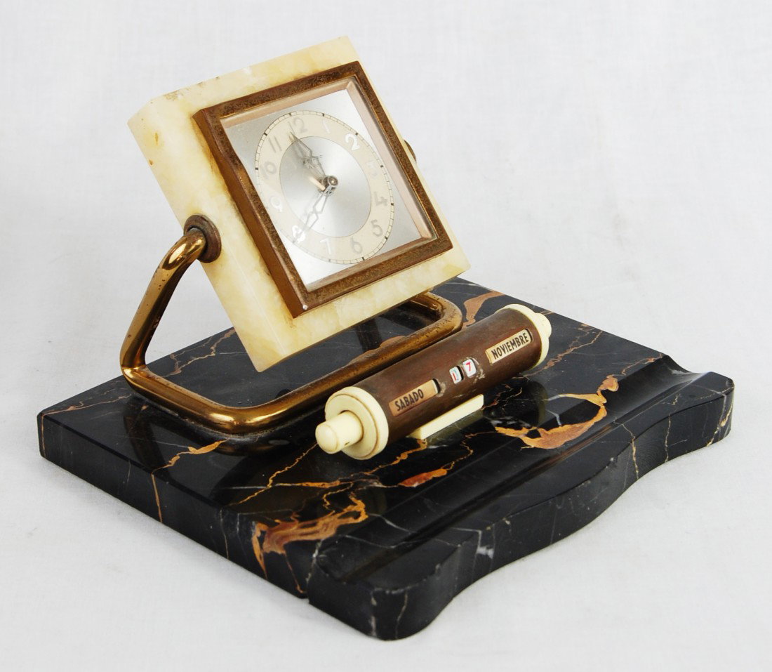 Vintage Deco Bayard Marble Desk Clock: DESCRIPTION: Marble and brass deco desk clock with center scroll date calendar and pen slab edging CIRCA: 1930's MADE IN: USA DIMENSIONS: H:5.25" L:6.25" RESERVE: None