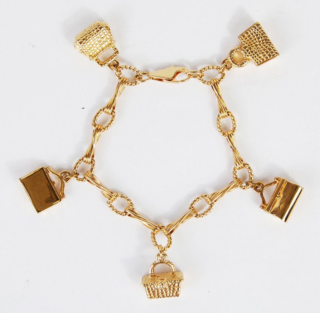 Cold Bond Vintage Judith Leiber Purse Charm Bracele: DESCRIPTION: Vintage hallmark Judith Leibar purse charms and twist link bracelet CIRCA: 1970's MADE IN: USA DIMENSIONS: L: 7.5'' RESERVE: None