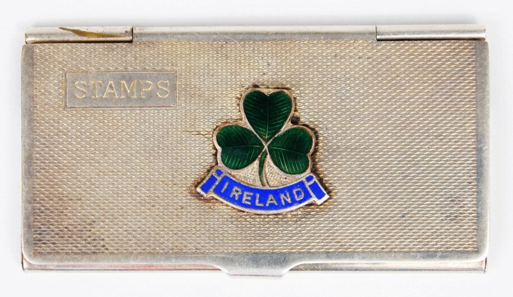 Antique Silver Ireland Stamp Box Case: DESCRIPTION: Sterling silver stamp Box case Hallmarked and pat Ireland CIRCA: Early 1900's MADE IN: Ireland DIMENSIONS: L 3'' x W: 1.5'' RESERVE: None