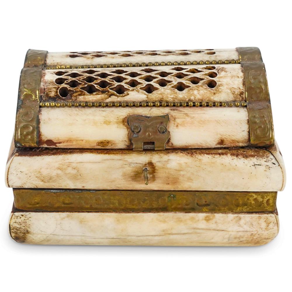 Vintage Camel Bone & Brass Treasure Trinket Box: DESCRIPTION: Vintage camel bone and brass treasure trinket box, designed with a rectangular form, and a curved lid decorated with reticulated open carvings and accented with brass applied motifs. CIRC