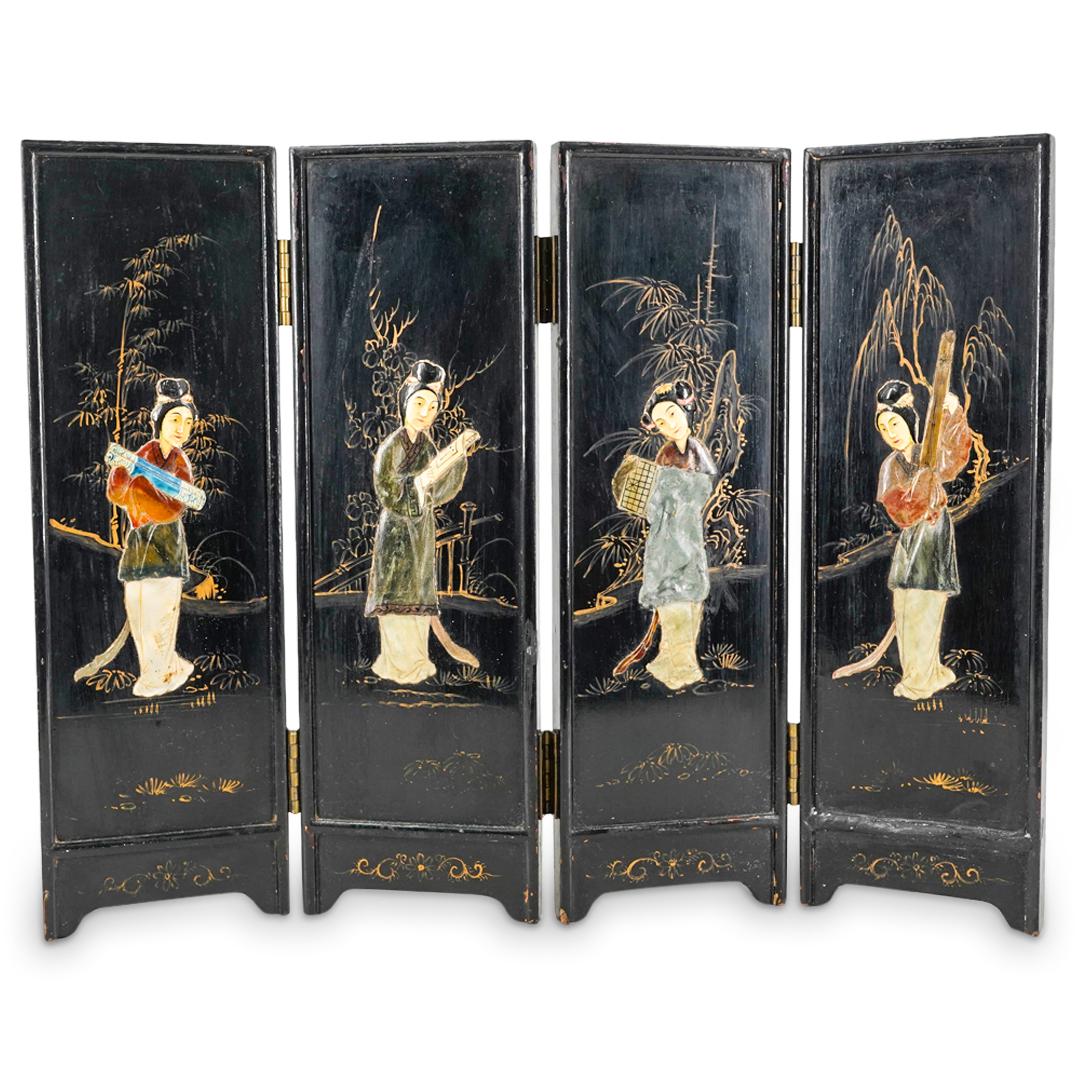 Vintage Chinese Lacquered Wooden Figural Screen: DESCRIPTION: Carved wooden screen coated in lacquer and featuring a carved bone and hard stone woman on each panel carrying a courtly item: one a scroll, one a parchment, one a xiang qi board, and one