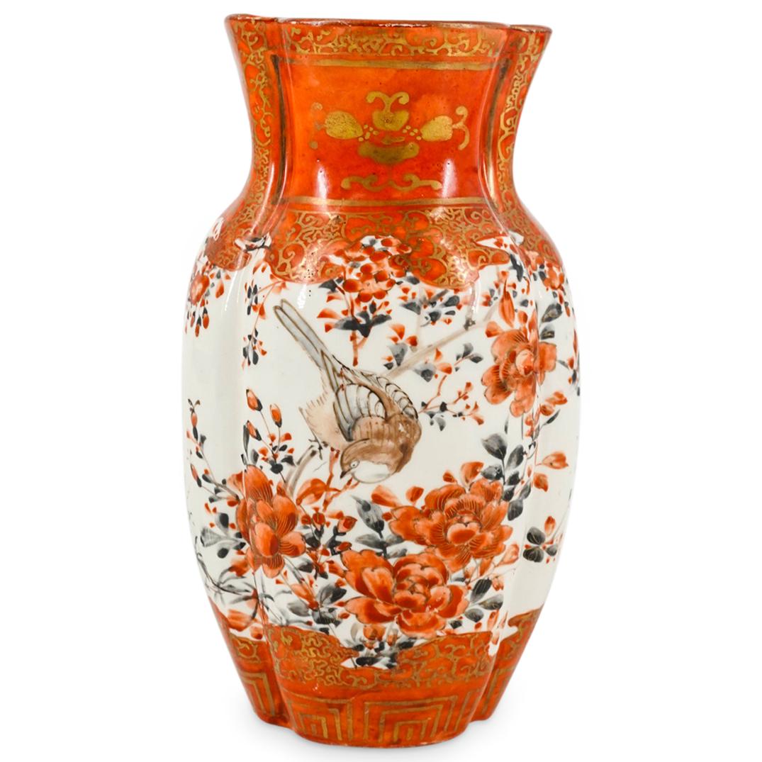 Antique Japanese Porcelain Kutani Vase: DESCRIPTION: Japanese Kutani orange and white vase featuring in lobed form, decorated with birds, flowers, foliage and gilt accents. Stamped with Kutani mark in Japanese on bottom. Also stamped on bot