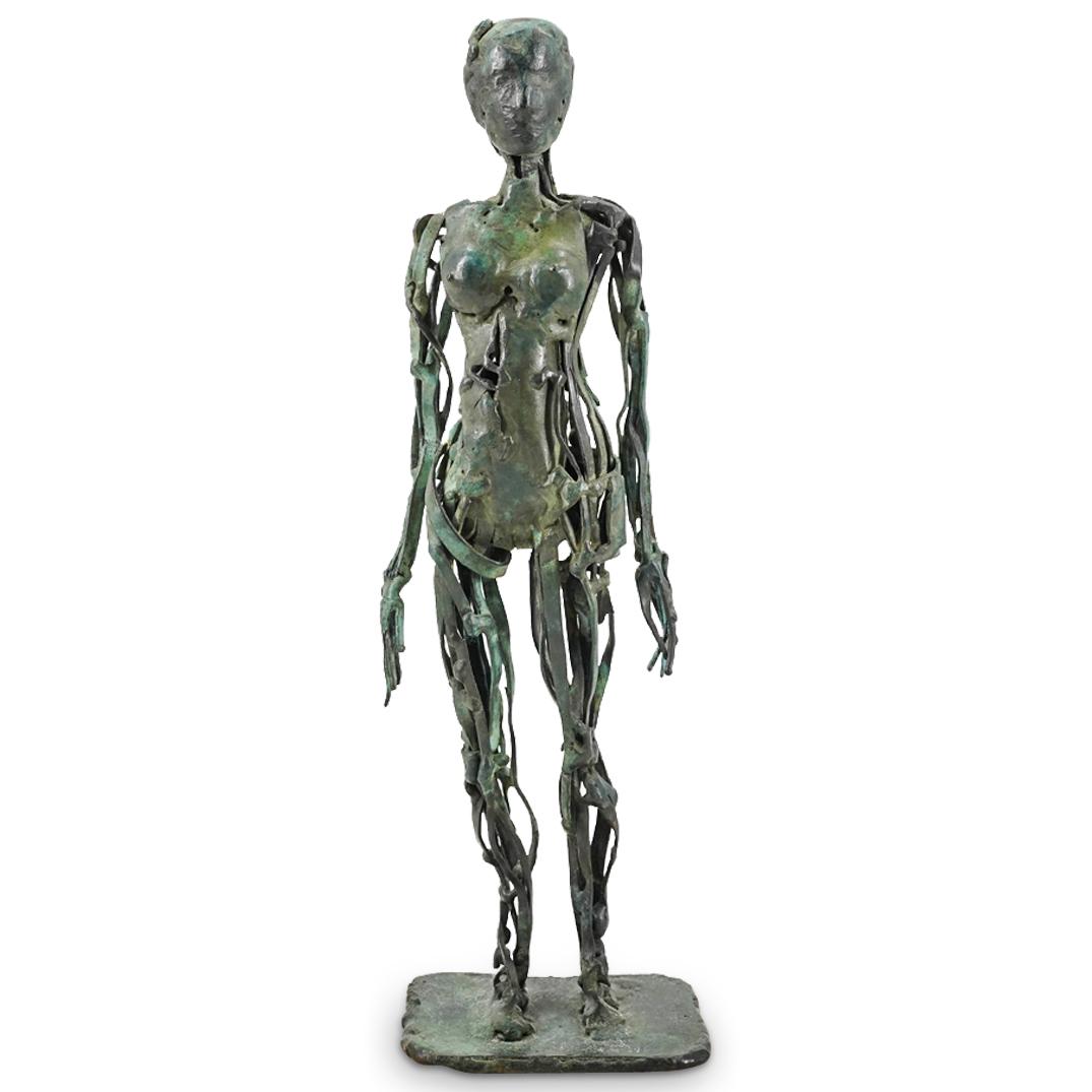 Brutalist Female Nude Bronze Statue: DESCRIPTION: Brutalist bronze statue depicting a standing female figure atop a marble base. Designed with a deconstructed manner in the style of sculpture Robert Michel Jones. In bronze with a greenis