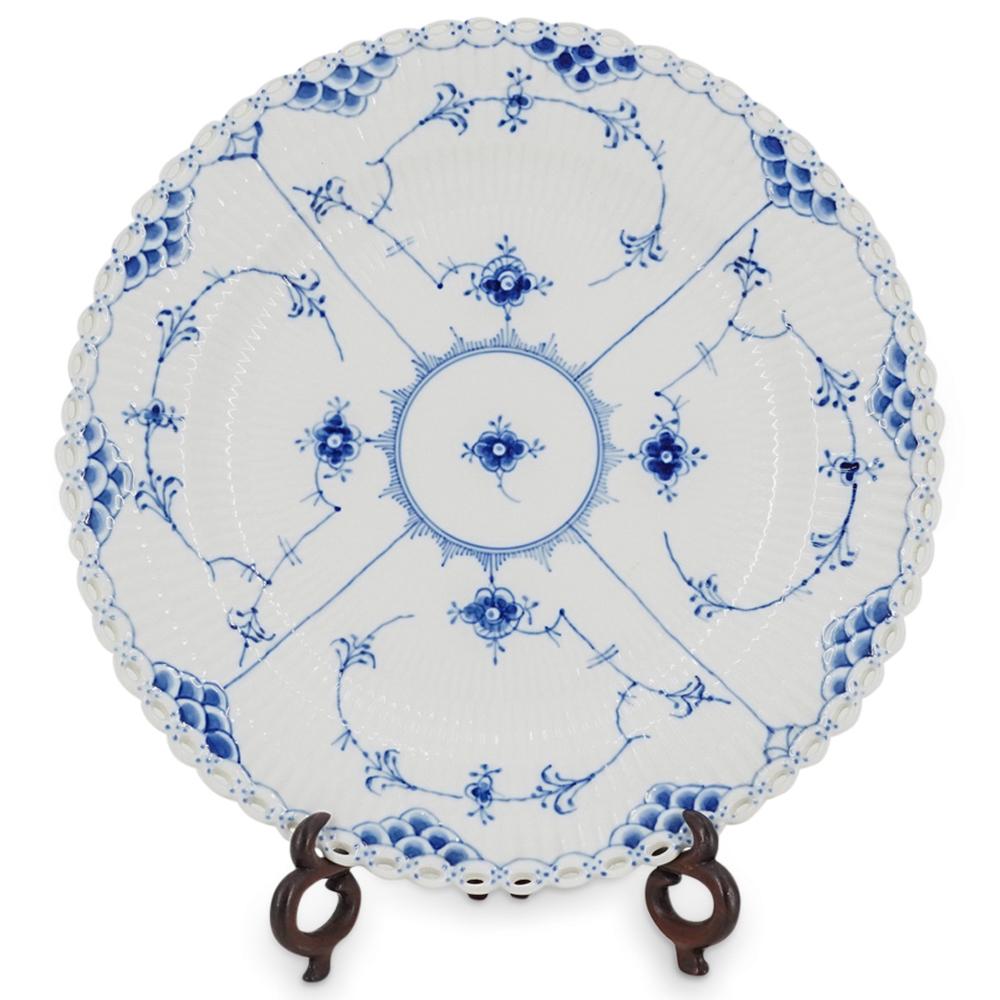 Royal Copenhagen Porcelain "Blue Fluted" Full Lace Dinner Plate: DESCRIPTION: A Danish Royal Copenhagen porcelain dinner plate in the "Blue Fluted" full lace" pattern. Embellished with painted blue floral motifs, full lace border, and no trim. The Royal Copenhagen