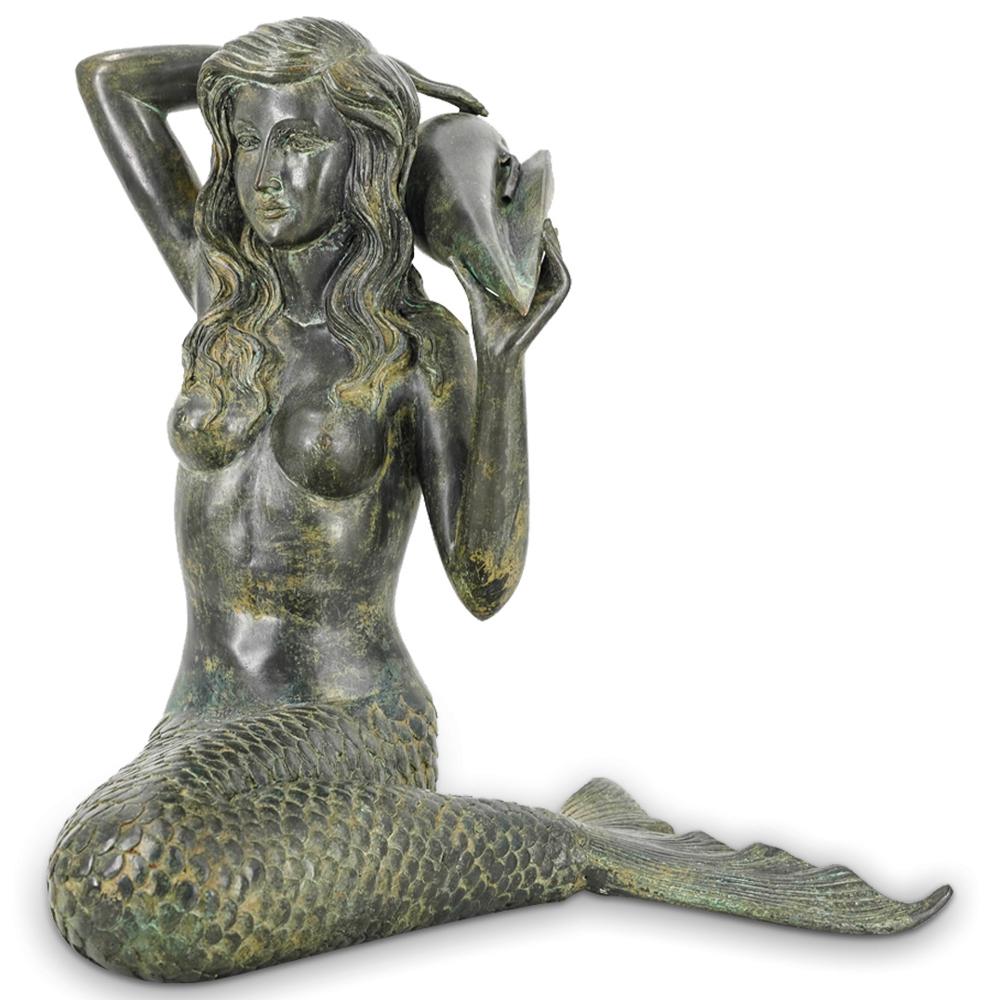 Mixed Metal Mermaid Figural Garden Fountain: DESCRIPTION: Patinated mixed metal figural garden fountain depicting a seated mermaid figure with nude torso, wavy hair and with her arms extended over her head while she is holding a large seashell, 