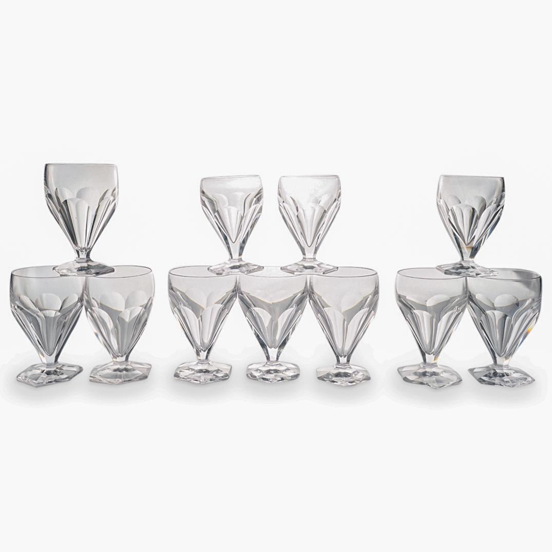 (11 Pc) Baccarat Style Crystal "Bourbon" Glasses Grouping Set: DESCRIPTION: (11 Pc) Baccarat style crystal footed footed glasses grouping set in the style of the Baccarat "Bourbon" cut crystal pattern, depicting cut panel designs on the bowl and hexagonal foot. T