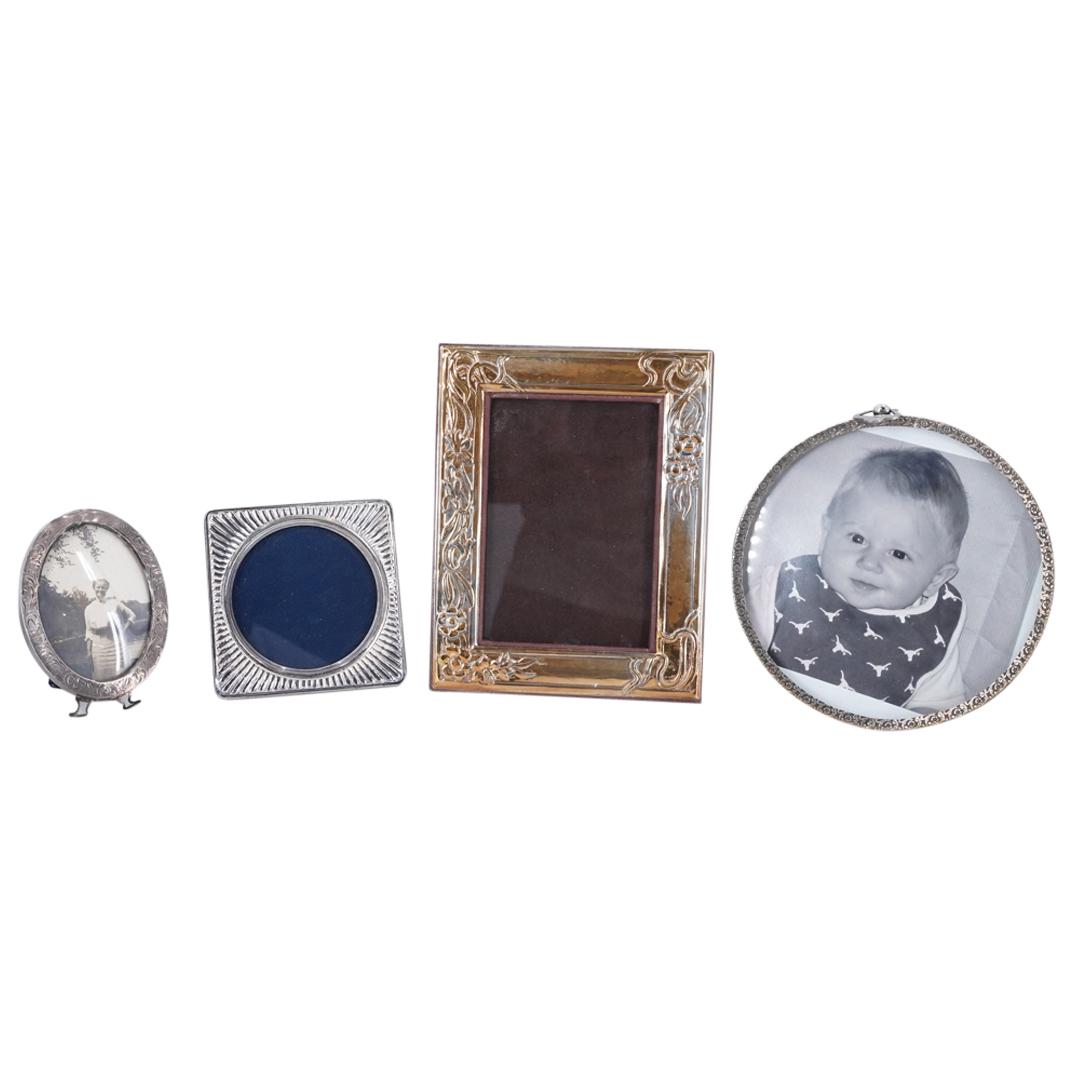 (4 Pc) Silver Plate Photo Frames Grouping Set: DESCRIPTION: (4 Pc) Silver plate photo frames grouping set with assorted sizes and styles. This set includes four (4) photo frames. CIRCA: 20th Century DIMENSIONS: H: 4" to 11" W: 3" to 7 1/4". CONDIT