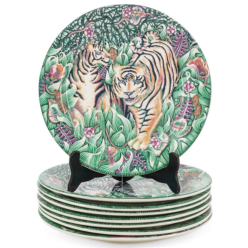(8 Pc) Painted French Faience Gien Pottery Plates: DESCRIPTION: (8 Pc) Painted faience pottery plates set by Faiencerie de Gien, with the motif "La Jungle" depicting exotic animals, such Zebras, Elephants, Giraffes, and tigers. Marked with "Gien La Ju