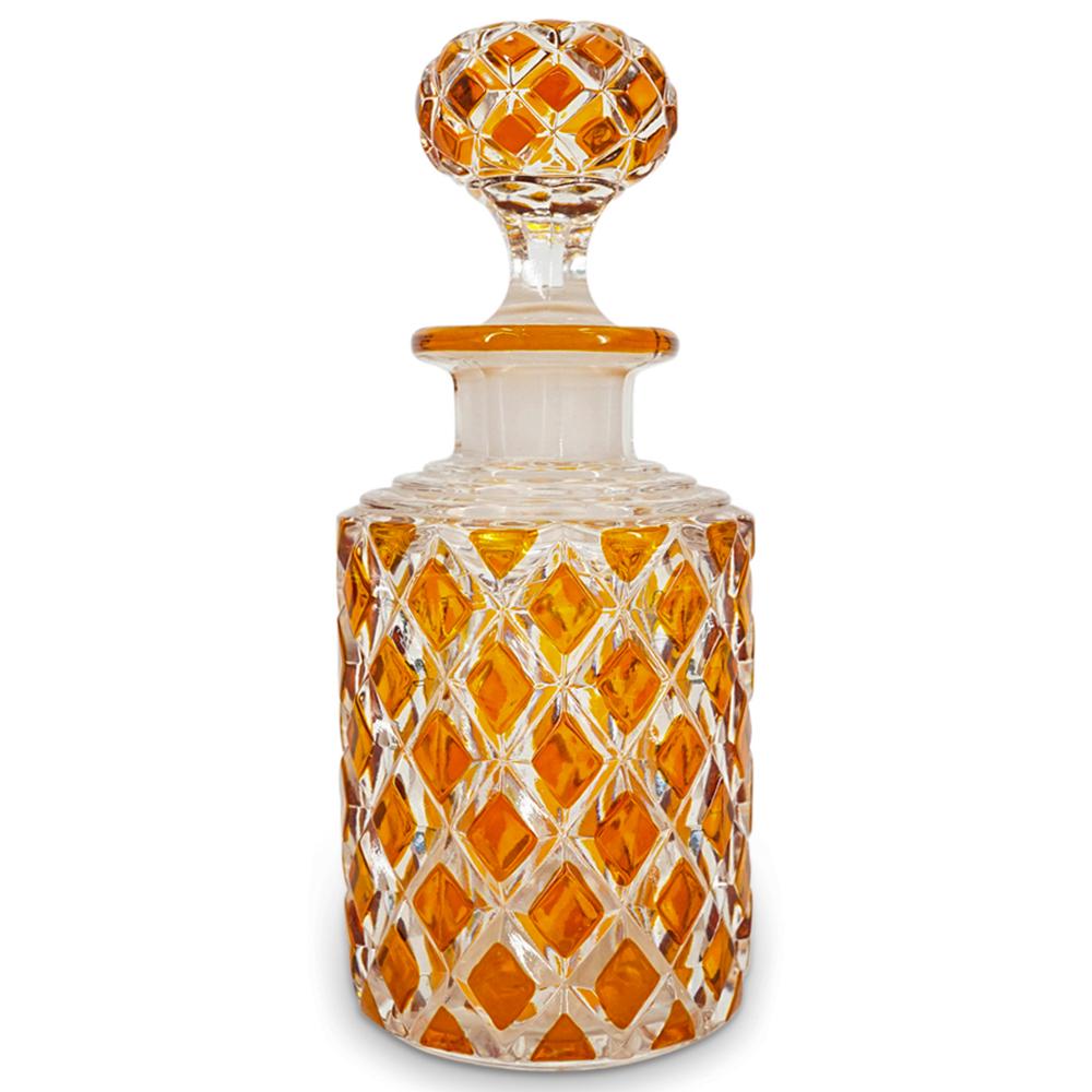 Bohemian Czech Amber Cut Glass Bottle: DESCRIPTION: Bohemian Czech amber to clear cut glass lotion perfume bottle with rounded form, embellished with diamond cut glass motifs. Includes a matching glass stopper. Marked with etched number 39