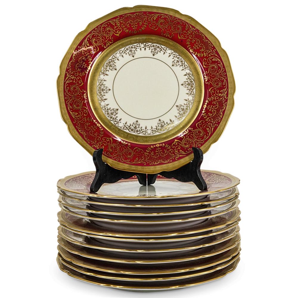 (12 Pc) Vintage Bohemia Porcelain Dinner Plates: DESCRIPTION: Twelve vintage red and gilt porcelain dinner plates featuring foliage and floral vine motifs. Each marked on underside with "Bohemia Made in Czechoslovakia CC R.H. Macy & Co." CIRCA: Mid