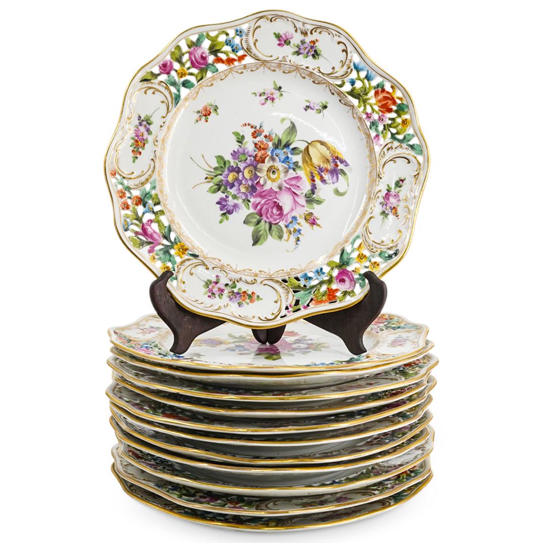 (12Pc) Antique Dresden Saxony porcelain Service Plate Set: DESCRIPTION: (12Pc) Dresden Saxony porcelain service plate set, features (12pc) entree plates with vibrant floral painted motifs, pierced, lattice rims, and scalloped edges. Each with underglaze Dresd