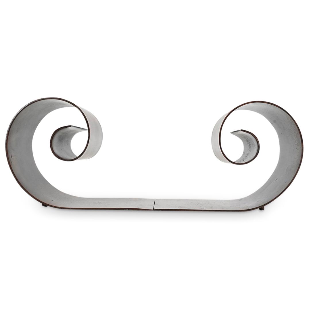 Pair of Scrolling Patinated Metal Bookends: DESCRIPTION: A pair of Patinated brown metal bookends in a scrolling form. CIRCA: 20th Century DIMENSIONS: H: " W: " L: " - CONDITION: Great condition. See lot description for details on item conditio