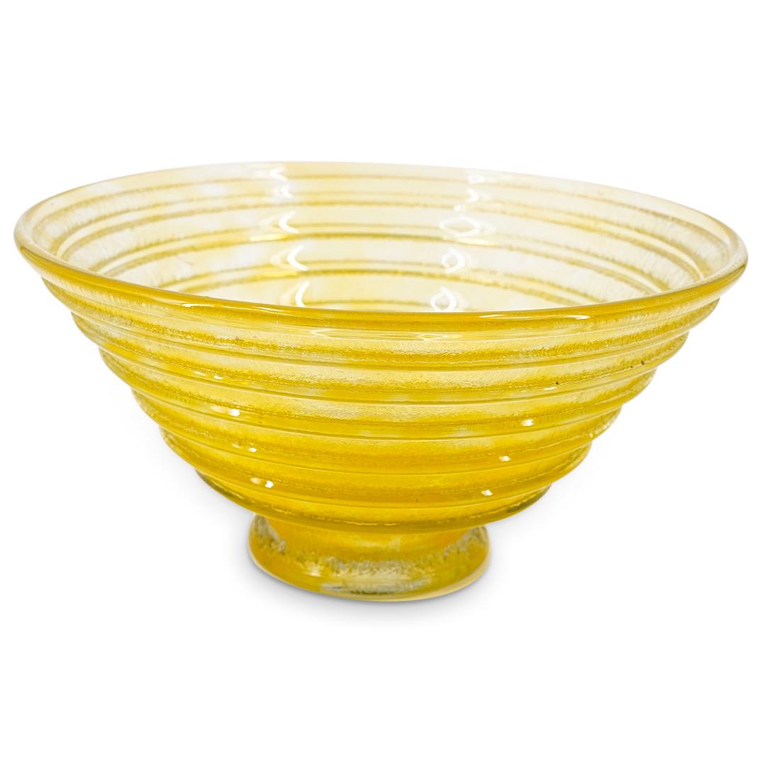 Daum Nancy Round Glass Centerpiece Bowl: DESCRIPTION: Daum Nancy round yellow round glass centerpiece bowl with frosted ribbed design and round footed base. Incised: "Daum Nancy France" CIRCA: 20th Century ORIGIN: France DIMENSIONS: H: 6" x