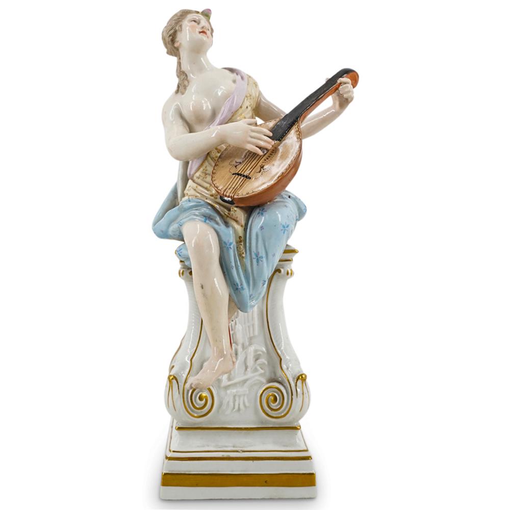 Antique Meissen Woman With Lute Porcelain Statue: DESCRIPTION: Antique Meissen polychrome hand-painted porcelain statue depicting a woman with a lute seated atop a pedestal and featuring musical instruments and foliage in relief on pedestal. Marked o