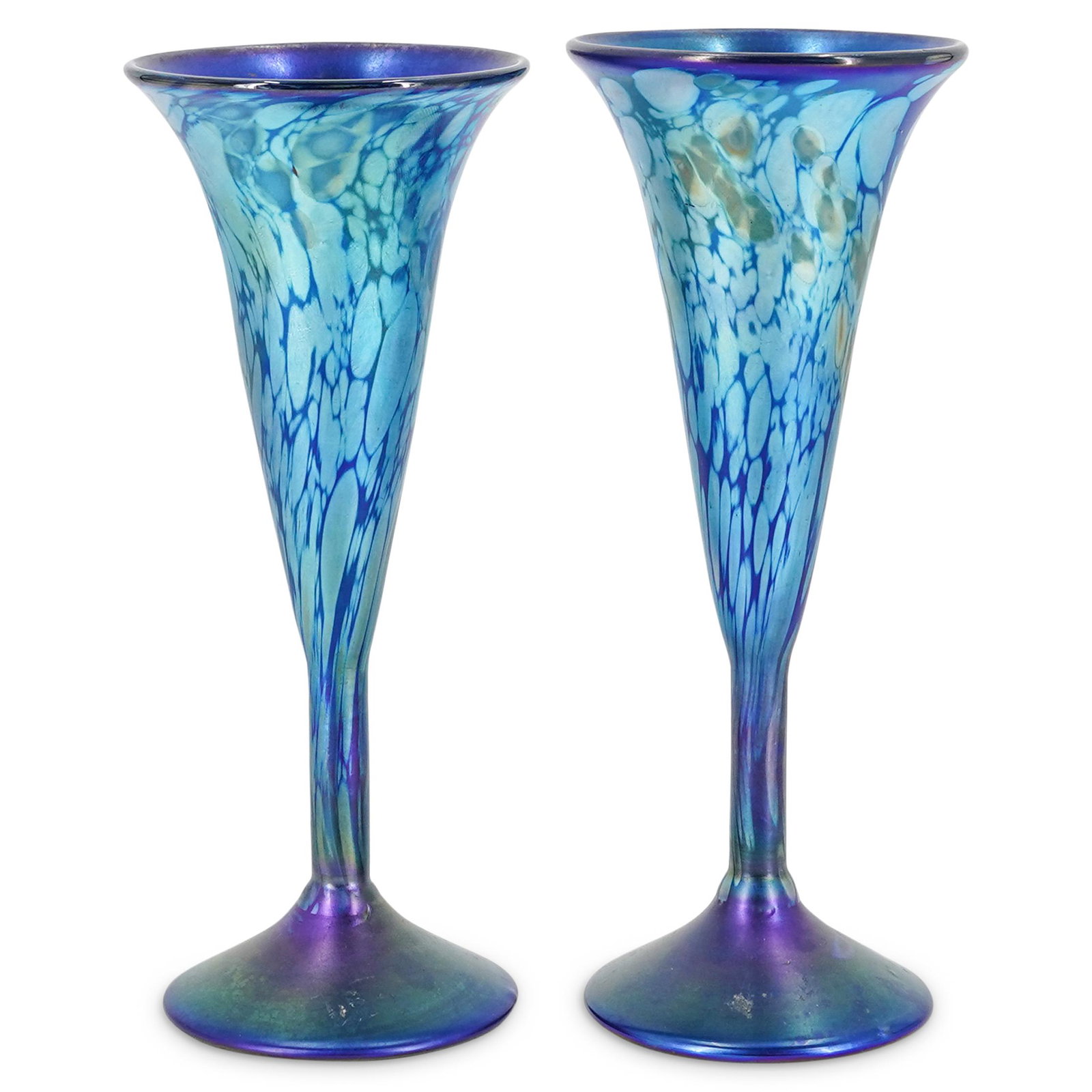 (2 Pc) Phenix Studio "Carl Radke" Iridescent Art Glass: DESCRIPTION: (2 Pc) A Pair of Carl Radke art glass vases in a blue & purple iridescent lustre glass designed with a footed tulip form. Signed "Carl Radke" "Phoenix Studio 83". Carl Radke founded art g