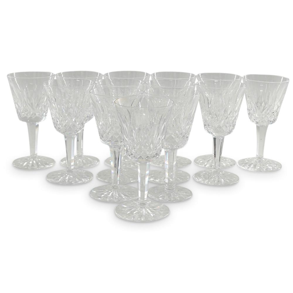 (13 Pc) Waterford Crystal "Lismore" Claret Wine Goblets Set: DESCRIPTION: (13 Pc) Waterford clear crystal stemware set of thirteen (13) claret wine goblets in the "Lismore" pattern, embellished with vertical cut designs on bowl and multi sided stem. Marked Wate