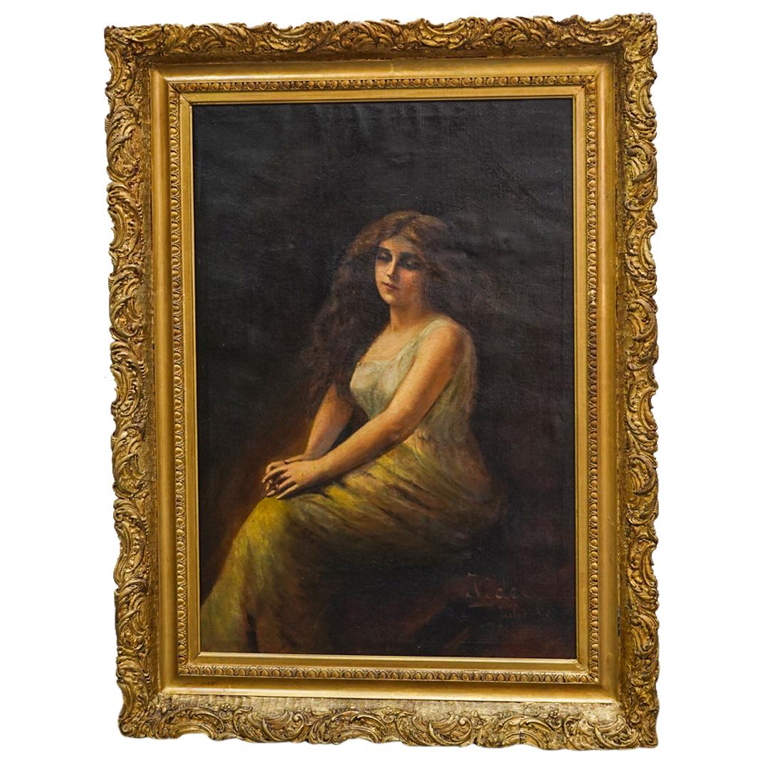 After Angelo Asti Draped Nude Oil On Canvas: DESCRIPTION: Oil on canvas painting after the portrait by Angelo Asti depicting a seated, contemplative woman with flowing hair and folded hands. Signed "Julio" at lower right and dated "1910". Mounte