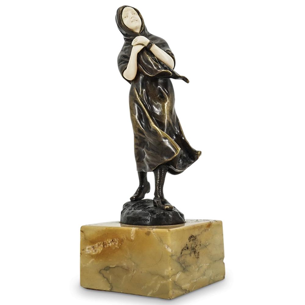 Peter Tereszczuk (Austrian, 1875-1963) Bronze And Bone Girl: DESCRIPTION: Art Deco bronze and bone sculpture by Peter Tereszczuk depicting a girl clutching flowing clothing to her body. Girl's skin and hair is bone, remainder of figure is gilt bronze. Signed "P