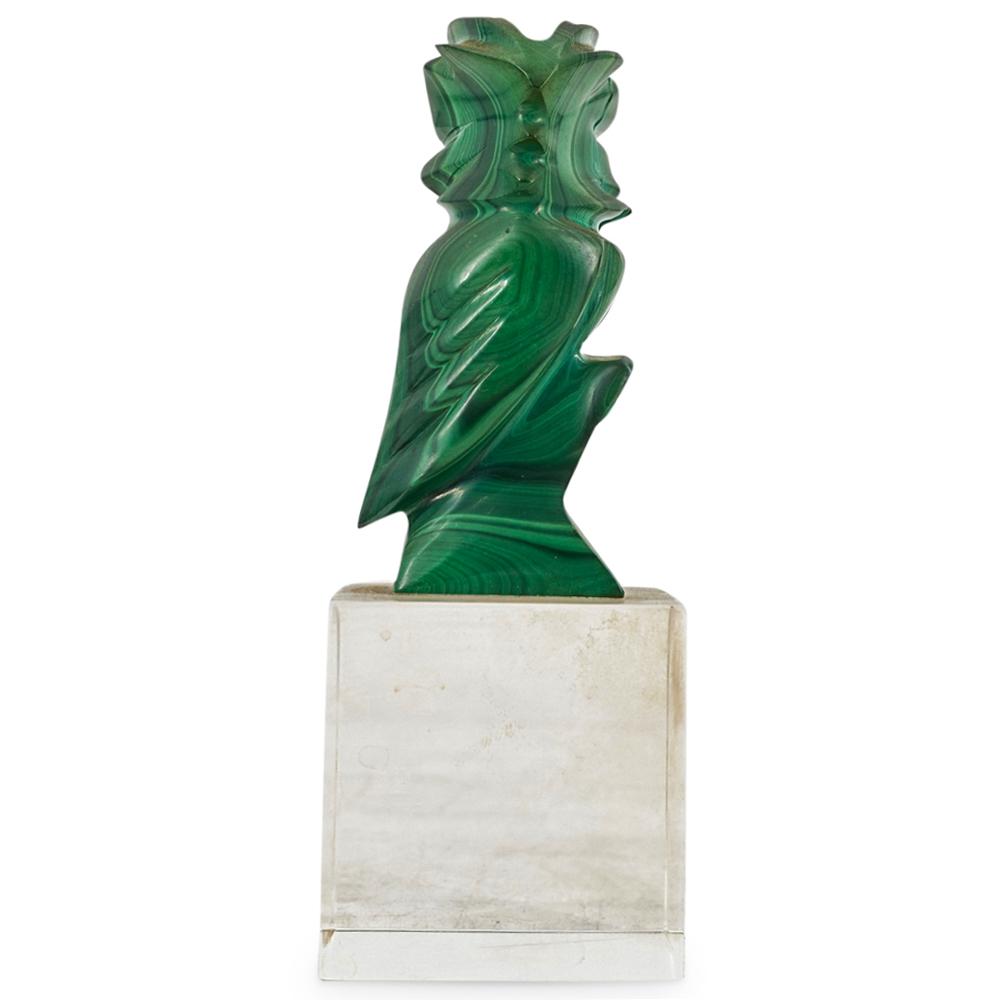 Malachite Carved Owl: DESCRIPTION: A malachite carved owl on lucite stand.CIRCA: 20th CenturyORIGIN: ContinentalDIMENSIONS: (Owl) H: 3.5" x D: 1.5" (Overall) H: 5.5" x D: 3"-CONDITION: Repaired and chipping. See lot descri