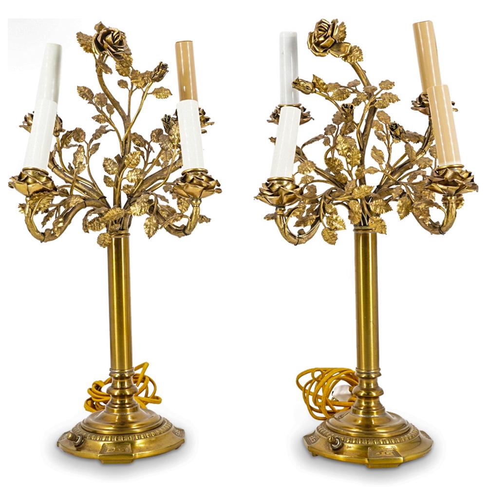 Antique Italian Toile Table Lamps: DESCRIPTION: A pair of antique Italian toile table lamps with flowing leafy branch and rose design, fitted with four candle motif lights raised off a round brass base.CIRCA: Early to Mid 20th CenturyO