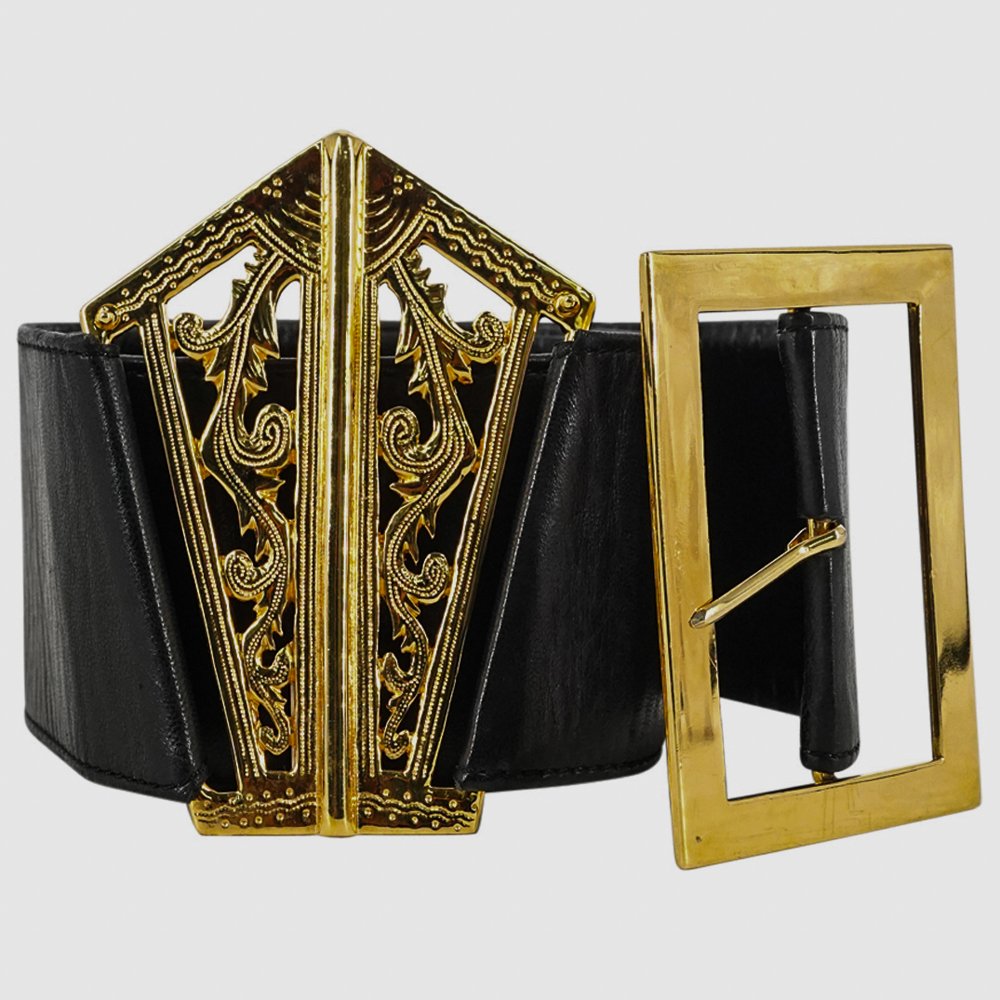 Vintage Chanel Black Leather Waist Belt: Vintage Chanel black leather waist belt with gold tone metal frontal embellishment with interlocking open work motif. Finished with back buckle closure. CIRCA: 20th Century ORIGIN: France DIMENSIONS: