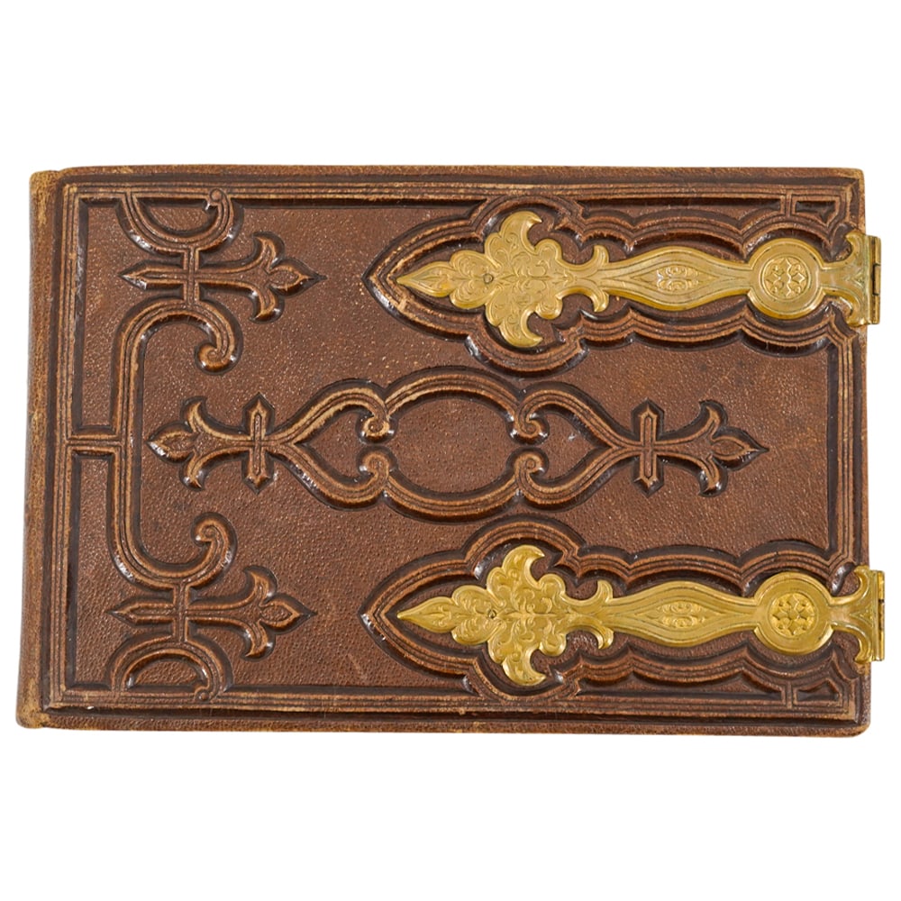 Antique Leather & Bronzed Metal Gothic Revival Sketch Book: DESCRIPTION: French Antique leather & bronzed metal Gothic Revival sketch book, in brown colored leather with gilt edge on pages. CIRCA: Late 19th Century ORIGIN: France DIMENSIONS: H: 6" W: 9" L: 1 1
