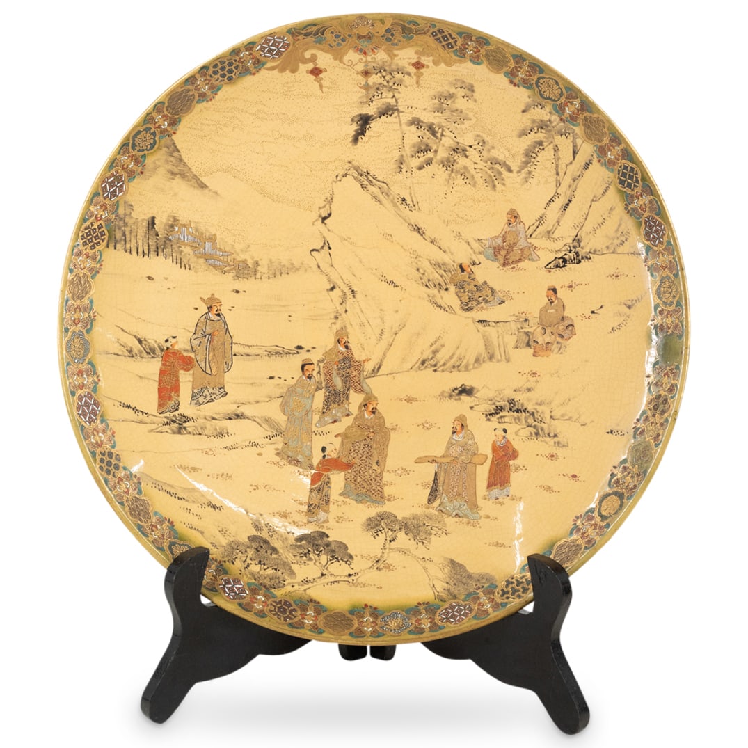 Antique Meiji Satsuma Porcelain Plate: DESCRIPTION: Antique Japanese Meiji period Satsuma porcelain plate featuring mountain scene populated by scholars and their squires. Completed with gilt and enamelled accents. Marked on underside. CIR