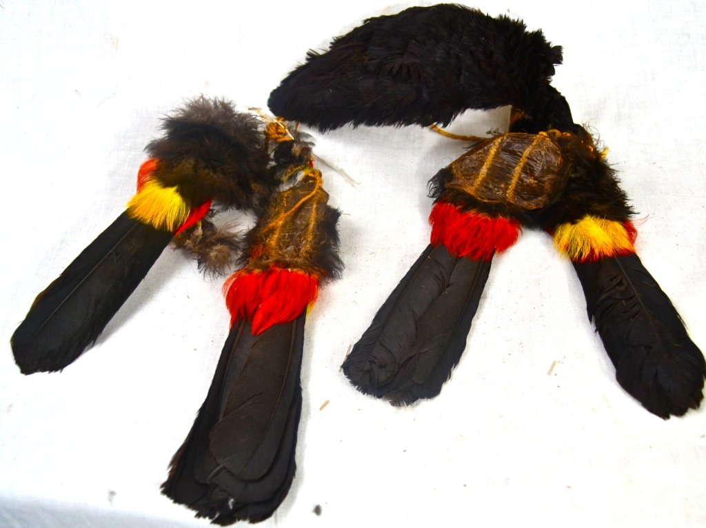 Antique Handmade feathered amazonian arm band.: DESCRIPTION: Antique Handmade feathered amazonian arm band. Arm band is made with rare feathers from the Amazon jungles. CIRCA: 1800's MADE IN: Amazon