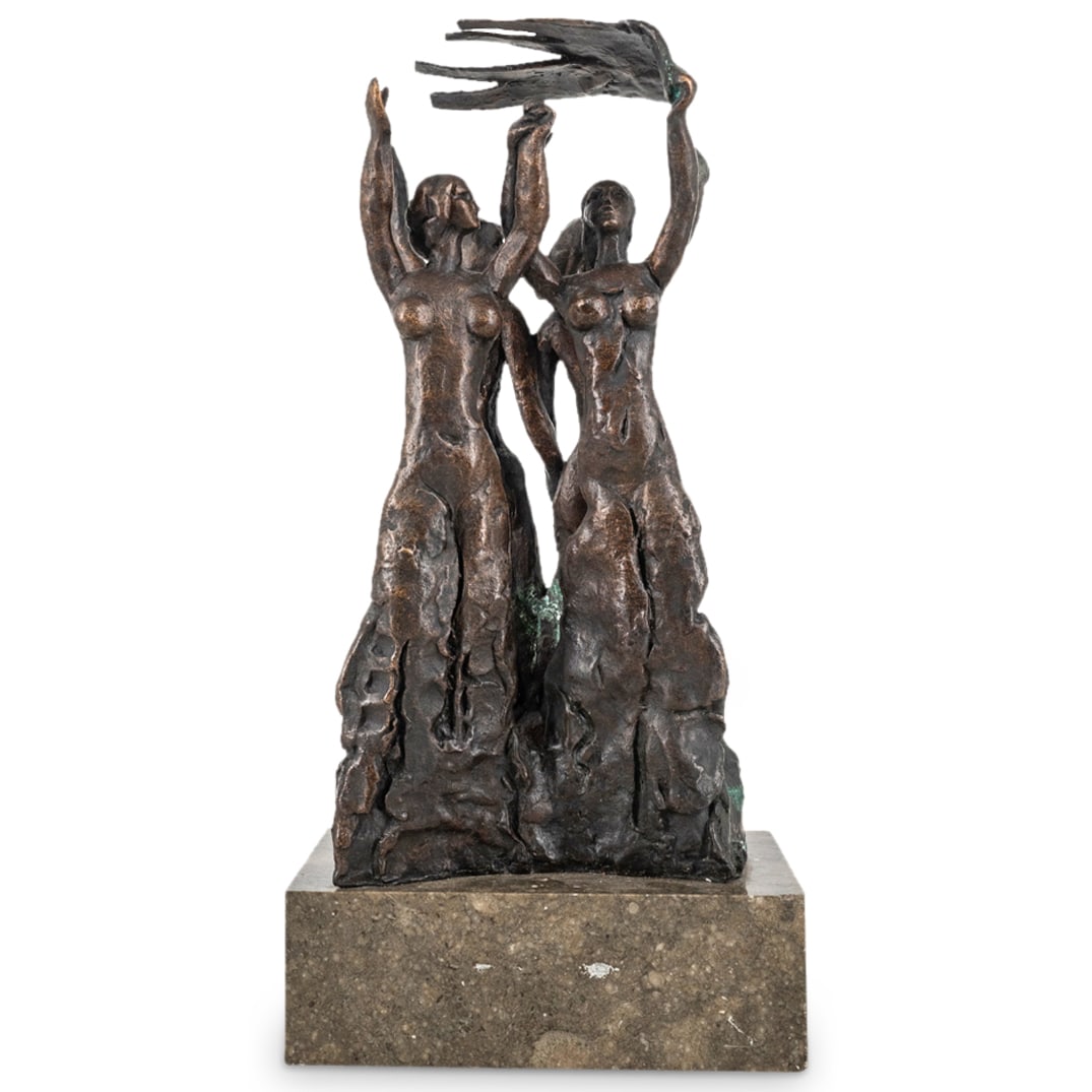 Vintage Signed Limited Bronze Modernist Sculpture: DESCRIPTION: Vintage bronze limited edition modernist sculpture depicting four nude women holding hands and a banner. Signed and dated "81". Numbered "7/12". Mounted to hard stone base. CIRCA: 1981 OR