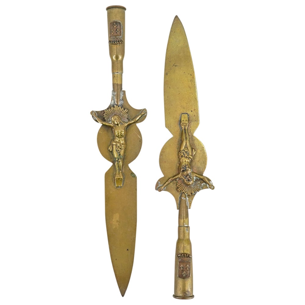 Religious Trench Art: DESCRIPTION: Religious trench art composed of ammunition shells mounted as brass letter openers with crucifixtion releif. CIRCA: Early 20th Century ORIGIN: France DIMENSIONS: H: 8.25" x D: 2" - CONDIT